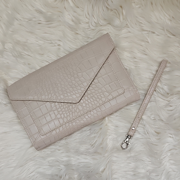 Sophisticated Cream Embossed Wristlet Clutch - Picture 1 of 7